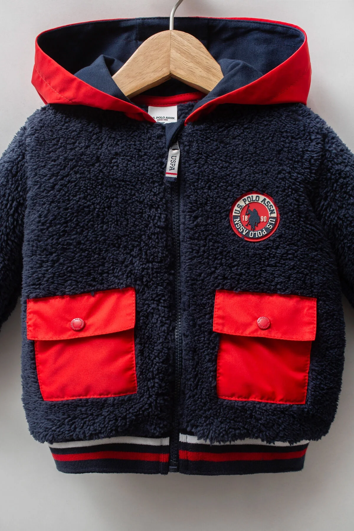 U.S. Polo Assn Erkek Bebek Lacivert Kapüşonlu Kaban, kırmızı detaylı, kaban & mont kategorisinde erkek bebek kıyafetleri