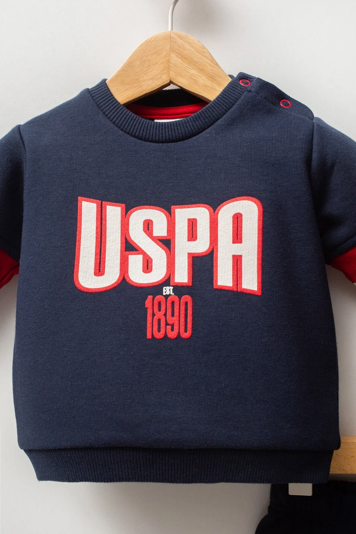 U.S. Polo Assn erkek bebek lacivert takım elbette, kırmızı detaylı sweatshirt ve pantolon, Arnetta markası