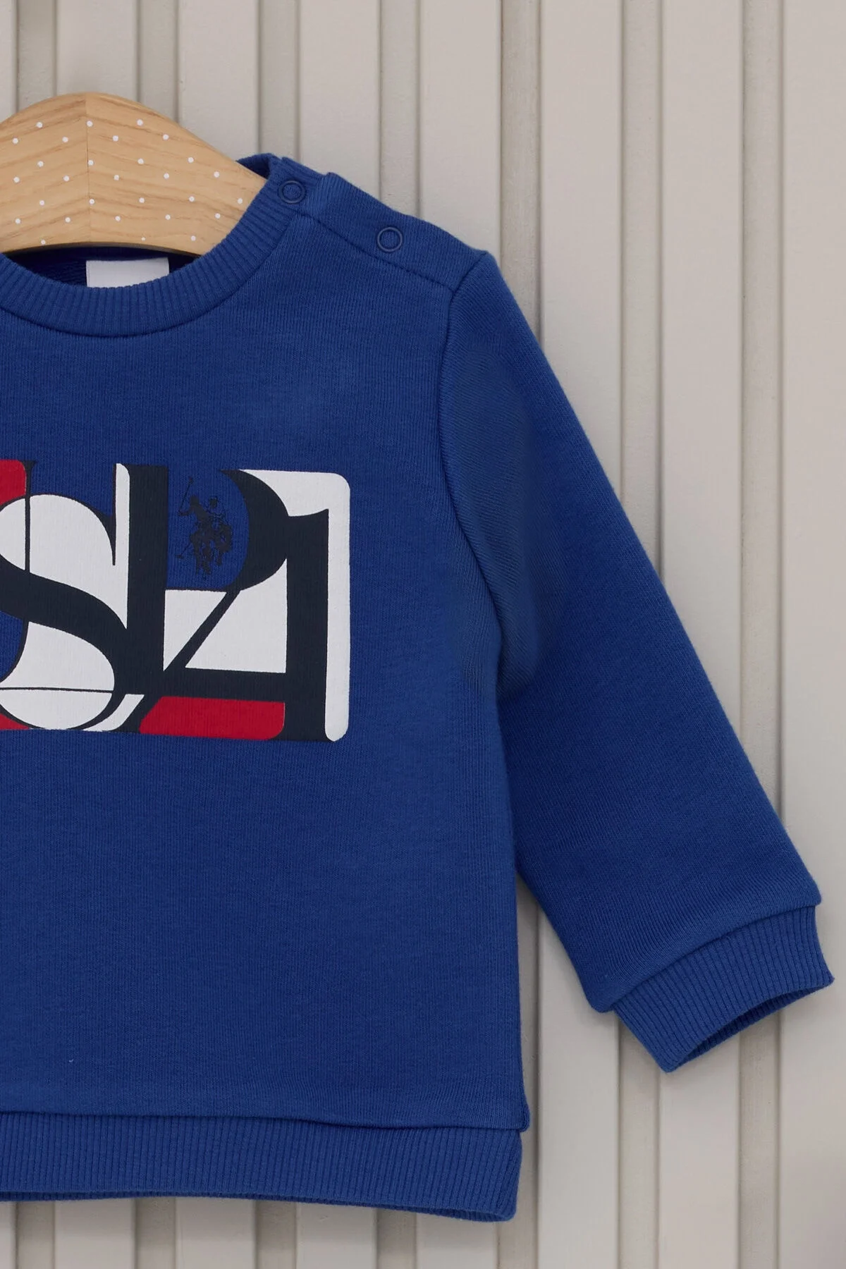 Mavi U.S. Polo Assn bebek takım elbette, uzun kollu sweatshirt ve pantolon, marka logosu ile çocuk giyim seti