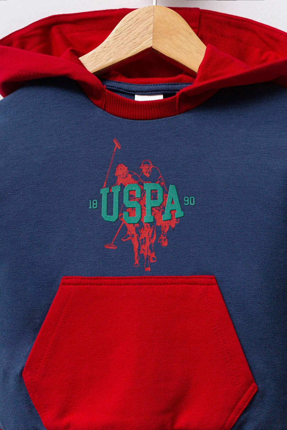 Mavi ve kırmızı detaylı U.S. Polo Assn bebek takım elbise, kollu kapüşonlu üst ve pantolon, Arnetta markası