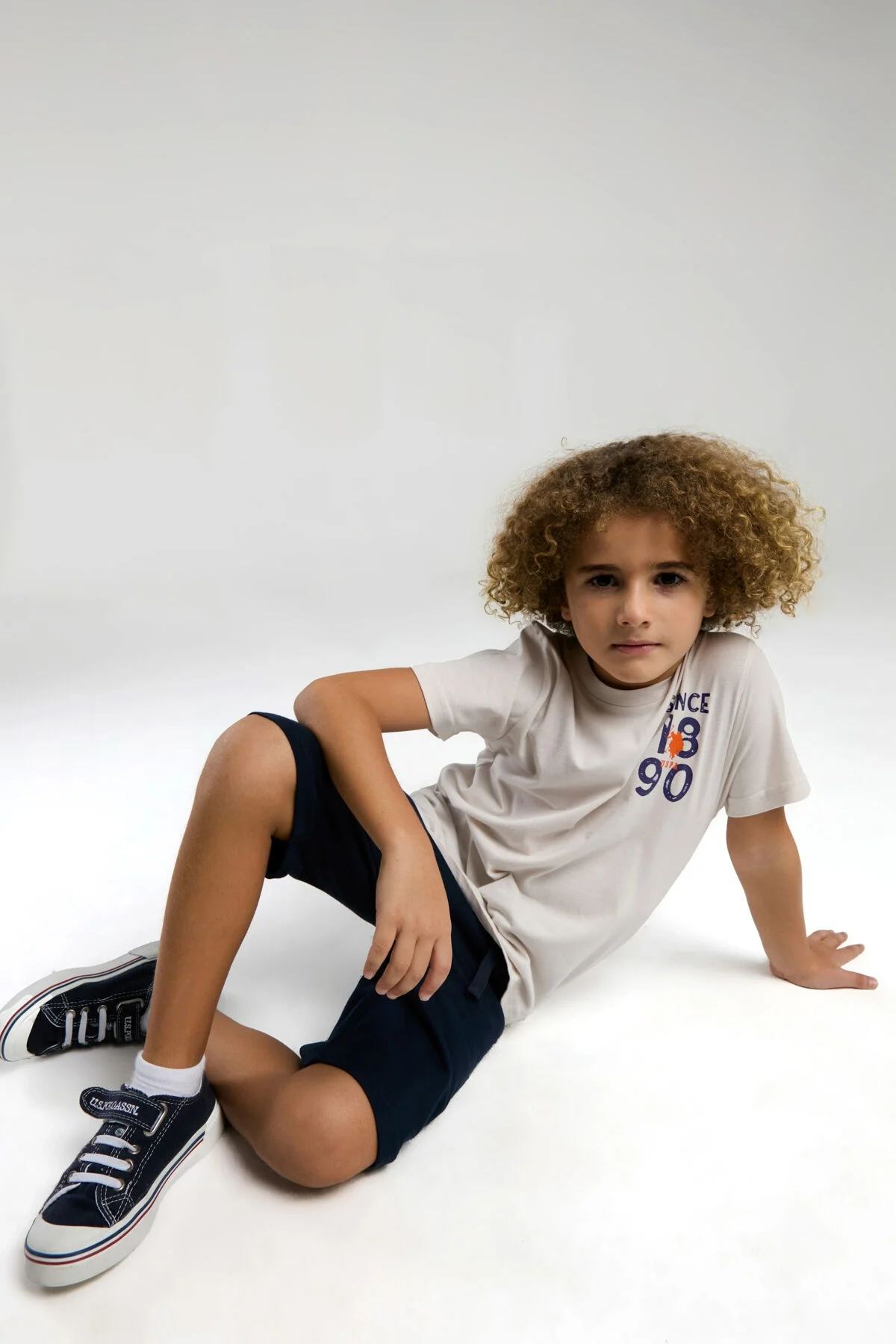 U.S. Polo Assn Erkek Çocuk Krem Bermuda Takım, Arnetta marka, beyaz gömlek ve koyu mavi kısa pantolon, çocuk modeli