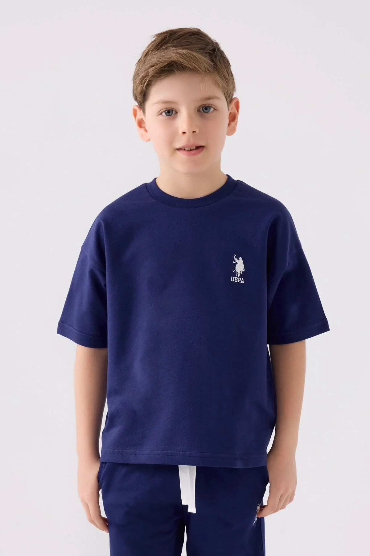 U.S. Polo Assn Erkek Çocuk Lacivert Bermuda Takım, marka logosu, çocuk modeli, spor stili, beyaz arka plan