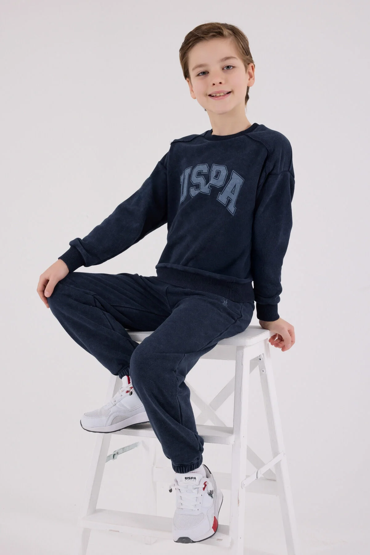 U.S. Polo Assn erkek çocuk lacivert eşofman takımı, USPA logosu, spor stil, çocuk giyim, kıyafet seti