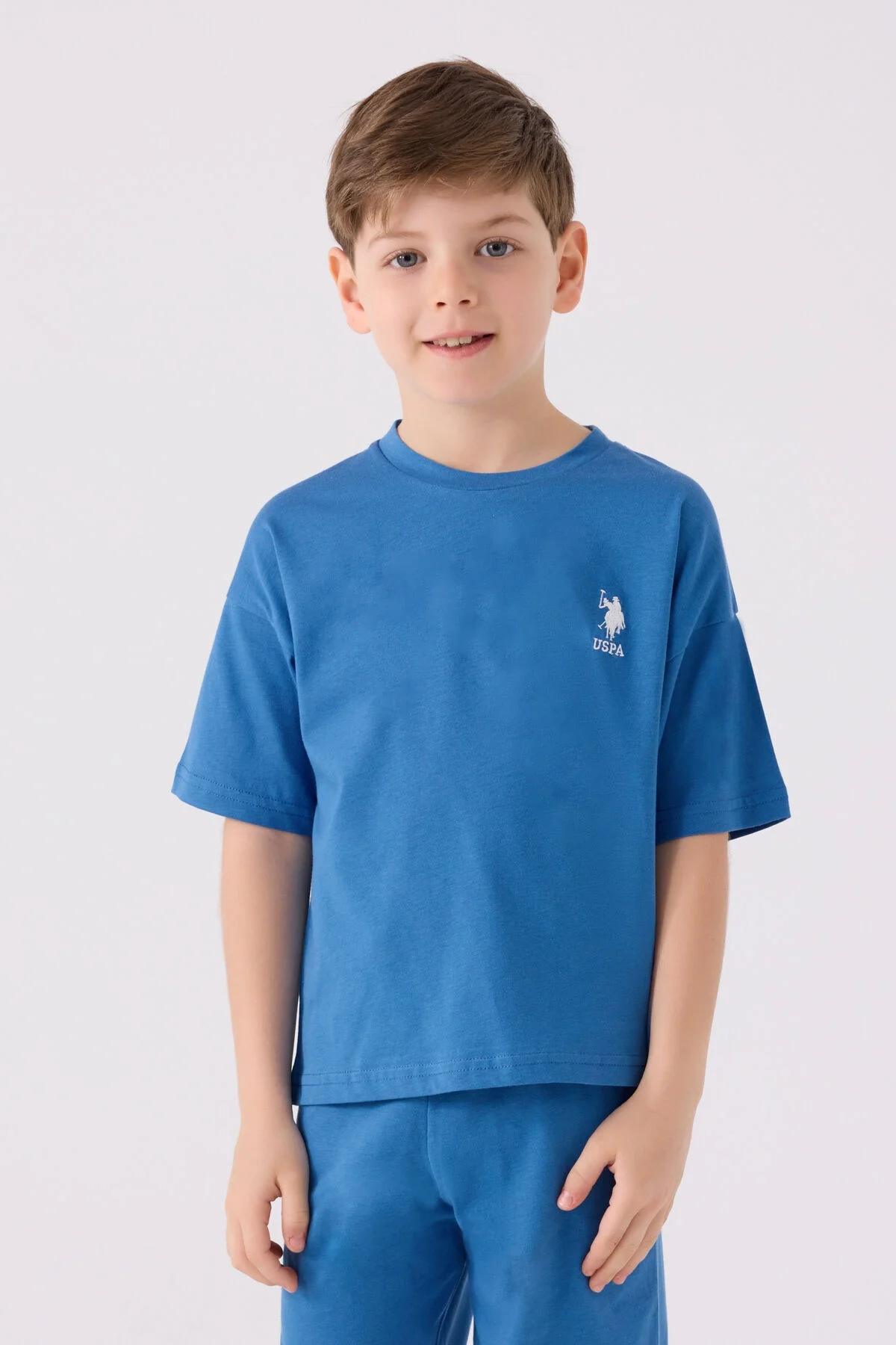 Mavi USP Polo Assn erkek çocuk Bermuda takım elbette, kıyafet seti, çocuk giyim, spor stil, beyaz arka plan