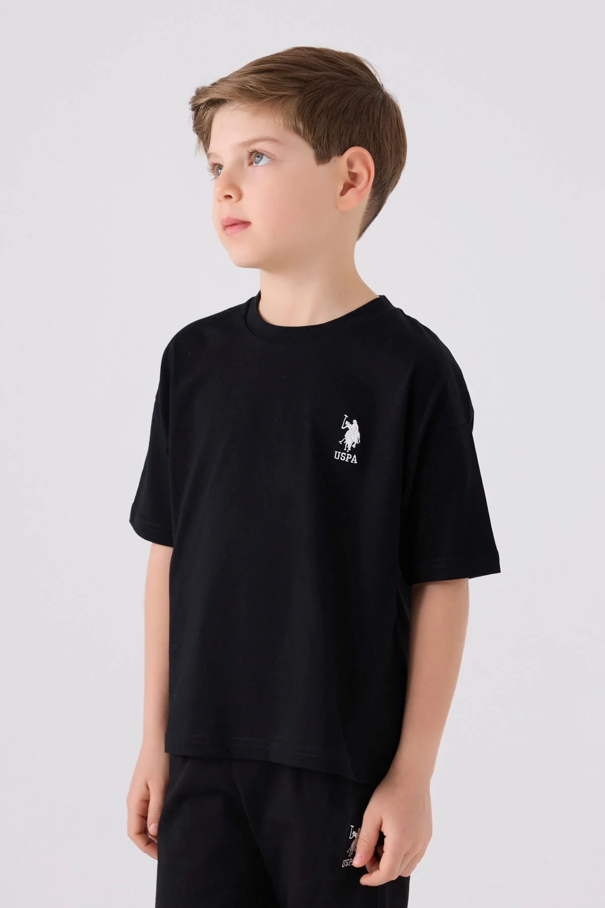 Siyah U.S. Polo Assn erkek çocuk Bermuda takım elbette, marka logosu ve spor stilinde çocuk giyim