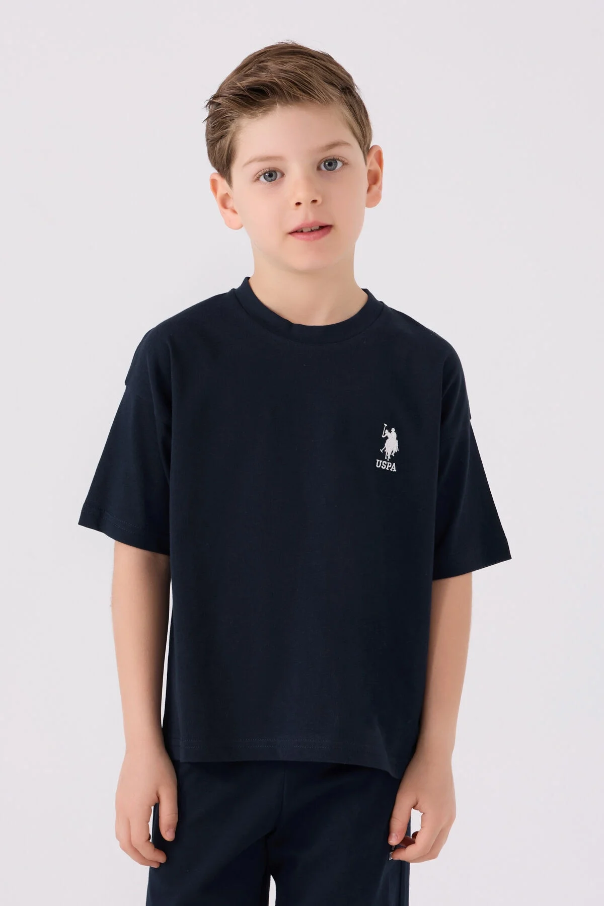 U.S. Polo Assn Erkek Çocuk Siyah Bermuda Takım, marka logosu, çocuk giyim, spor stili, beyaz arka plan