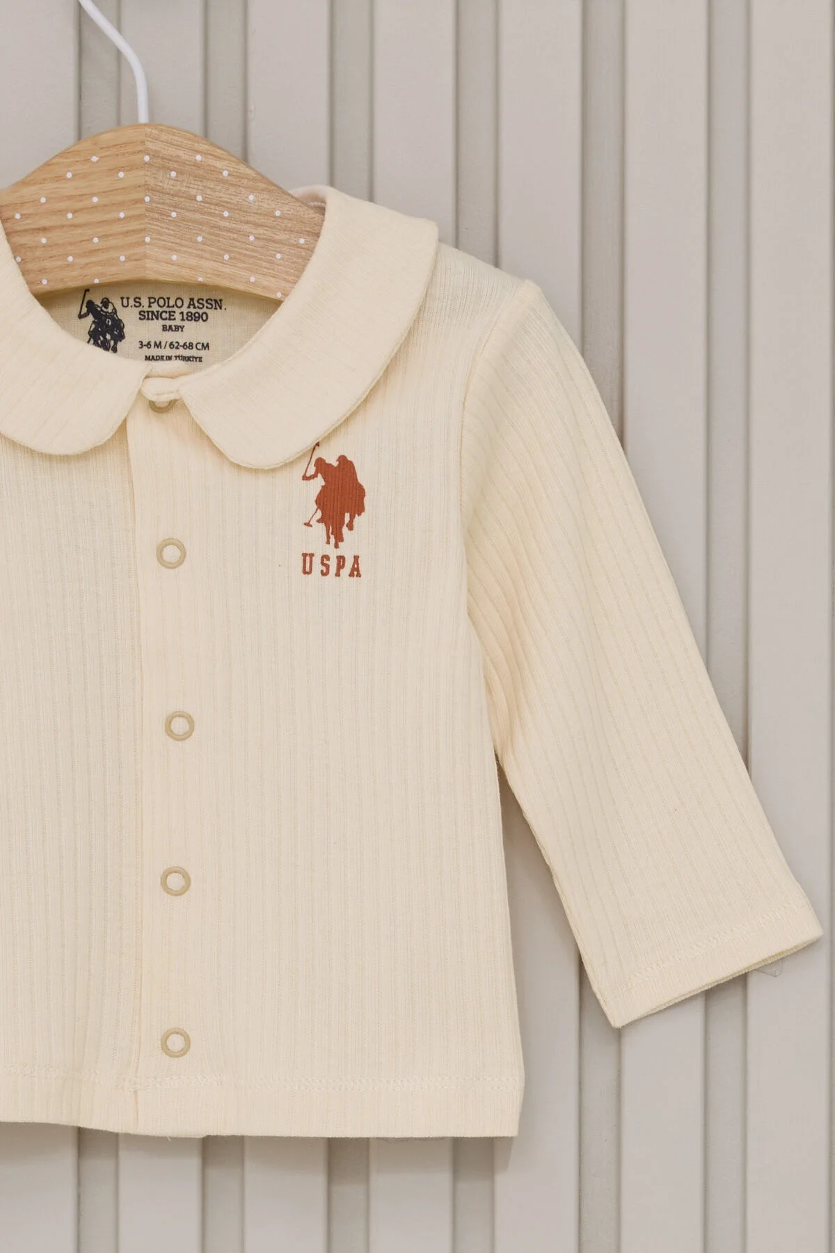 Krem renkli U.S. Polo Assn kız bebek takımları, yıldız ve ay desenli, kollu ceket ve ayaklık pantolon, bebek giyim seti