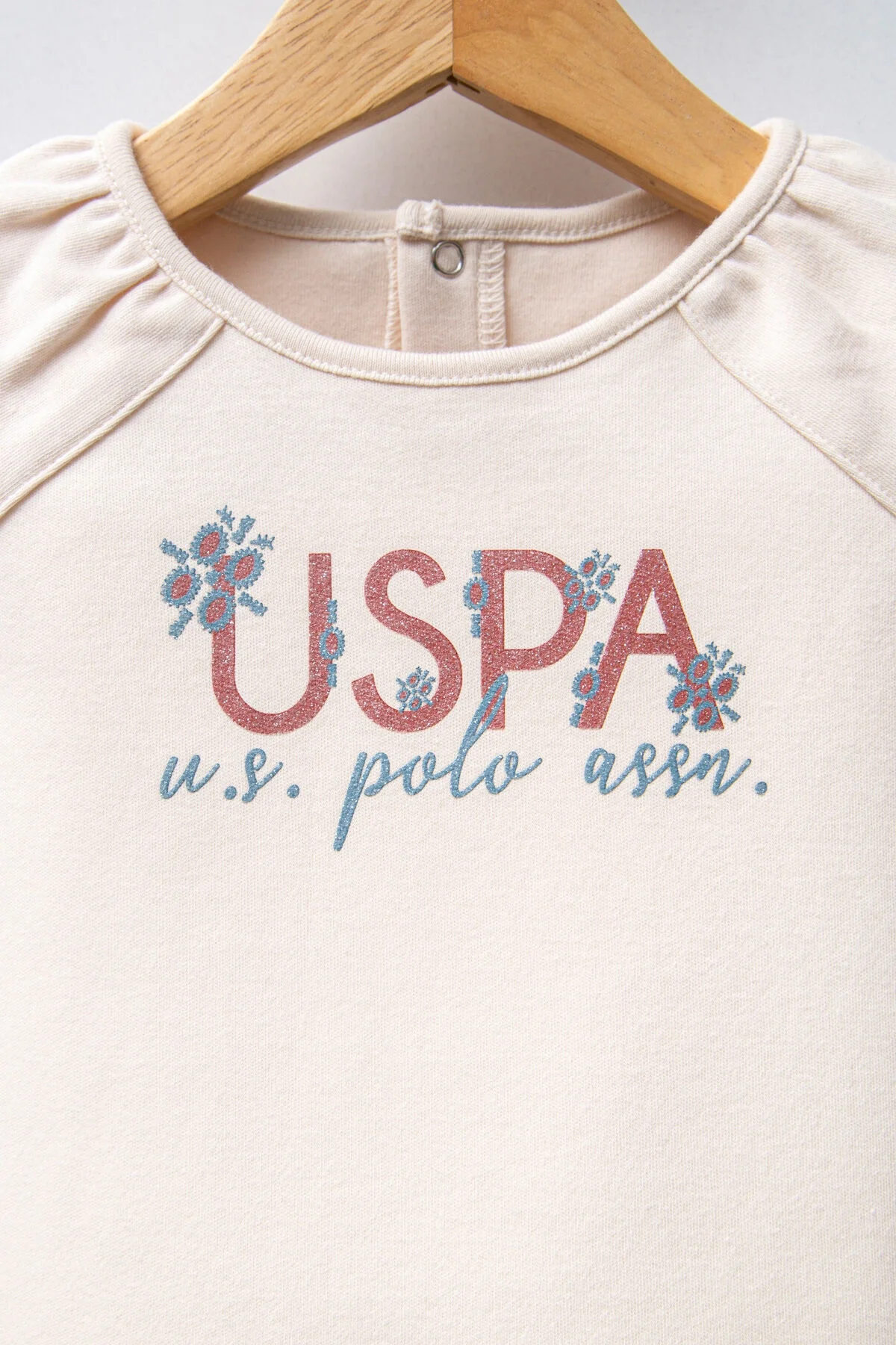 U.S. Polo Assn Kız Bebek Krem Takım, mavi desenli etek ve beyaz üst, bebek giyim seti