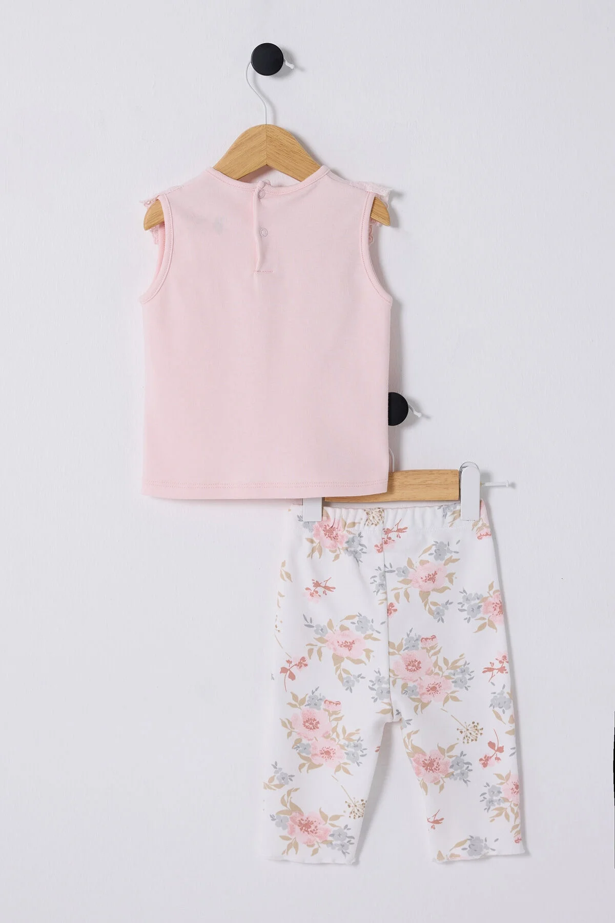 Pembe dantelli bebek takım elbette, floral desenli pantolonlu, U.S. Polo Assn marka kız bebek giyim seti