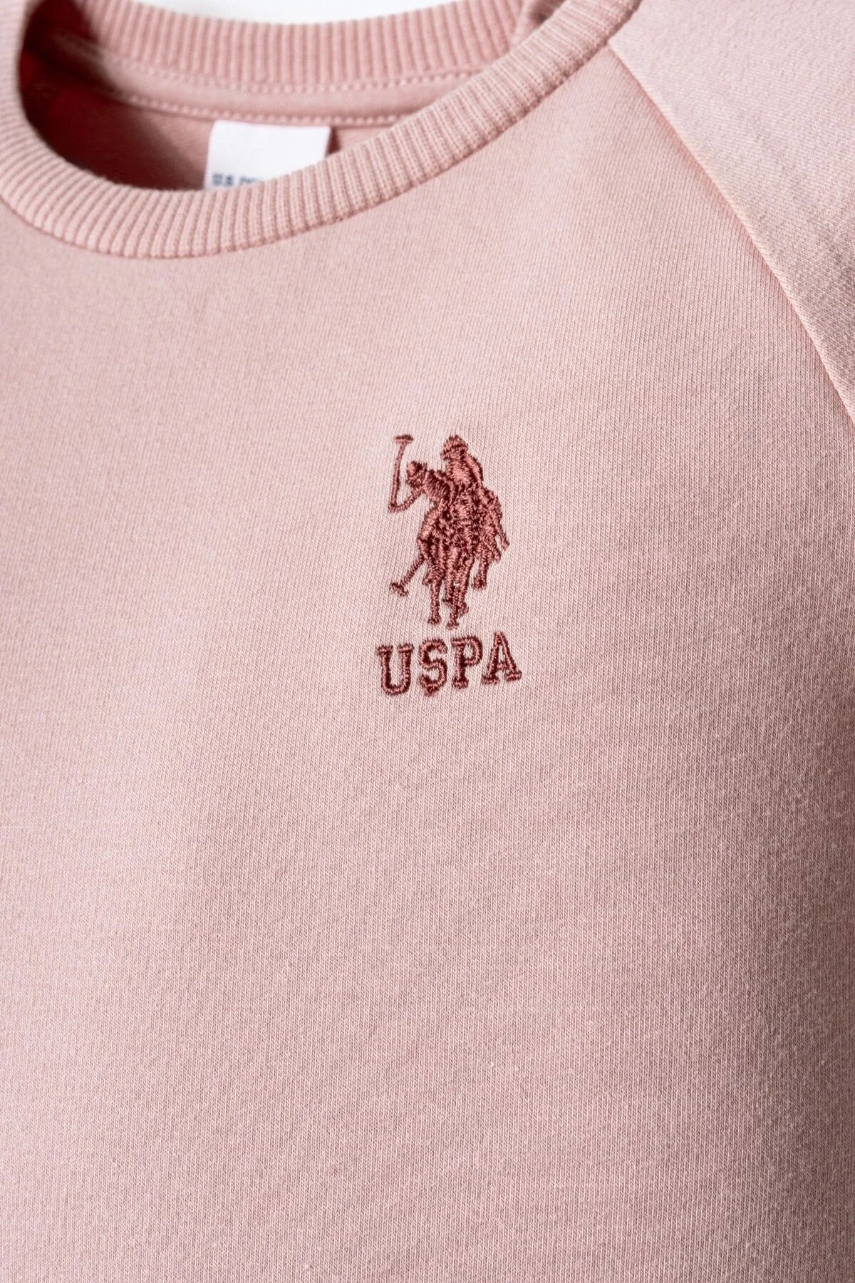 Pembe U.S. Polo Assn kız bebek takım elbette, uzun kollu tişört ve elbette pantolon, marka logosu ile bebek giyim seti