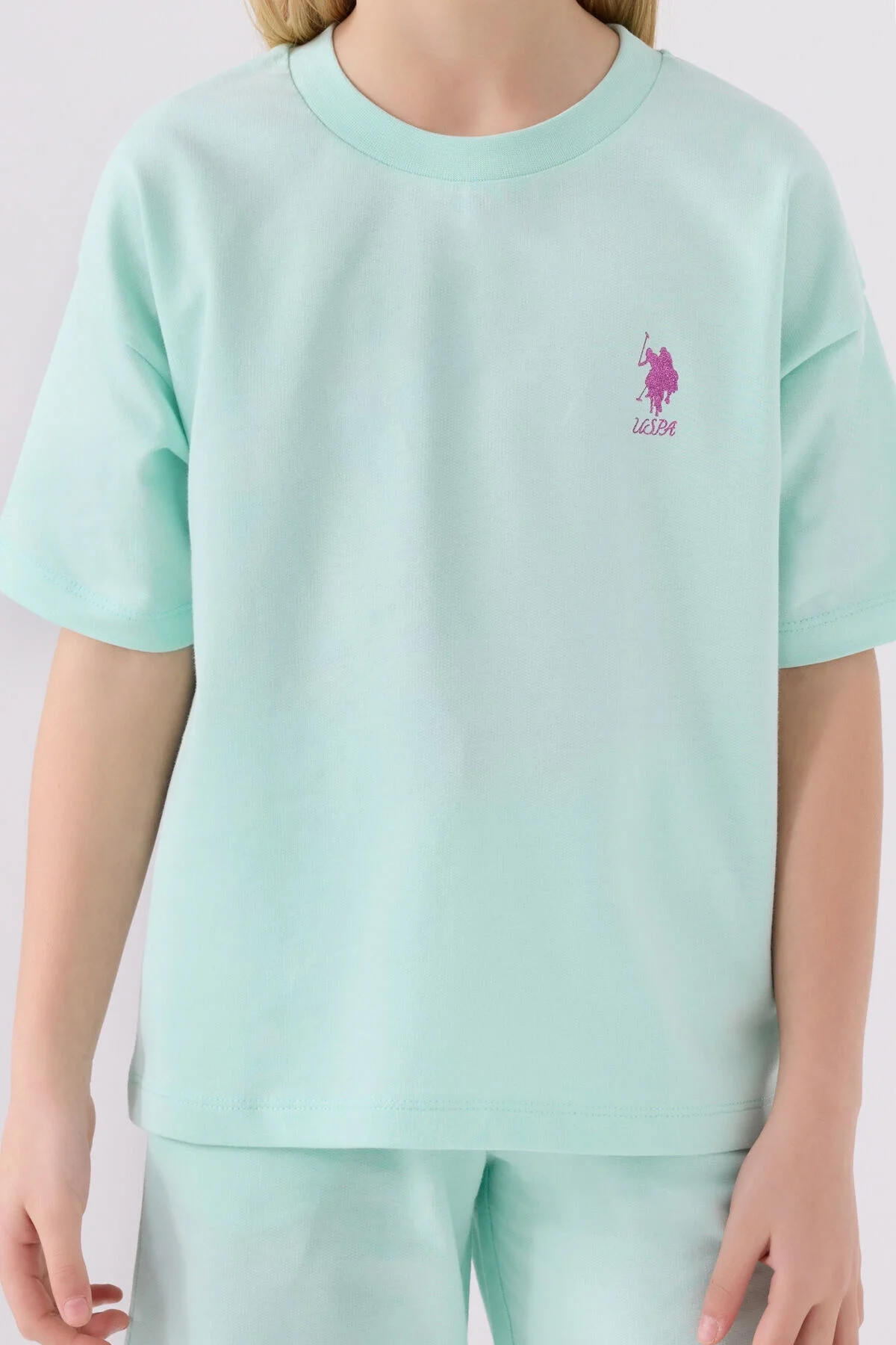 Mavi U.S. Polo Assn kız çocuk Bermuda takım elbette, ön ve yan görünüm, Arnetta markası, spor ve günlük giyim
