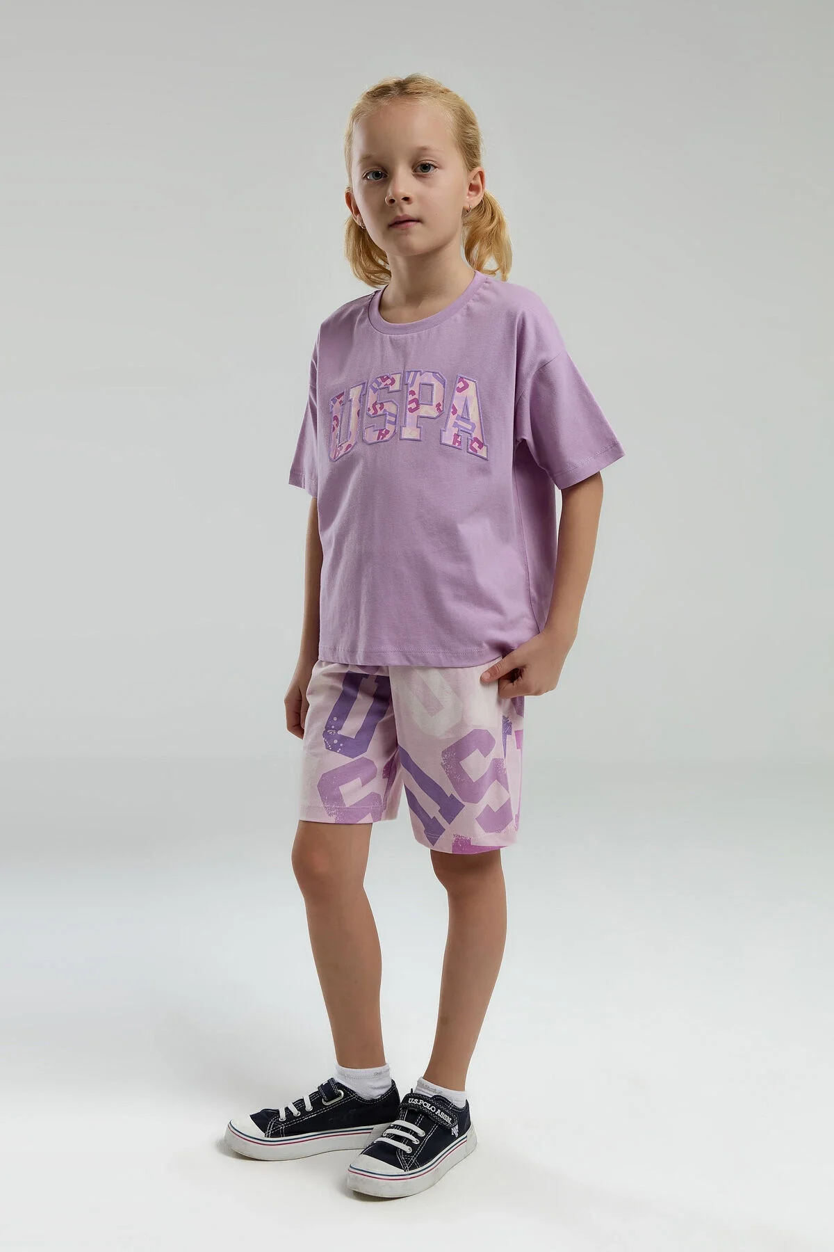 Mor U.S. Polo Assn kız çocuk Bermuda takım elbette, desenli kısa pantolon ve tişört, çocuk giyim