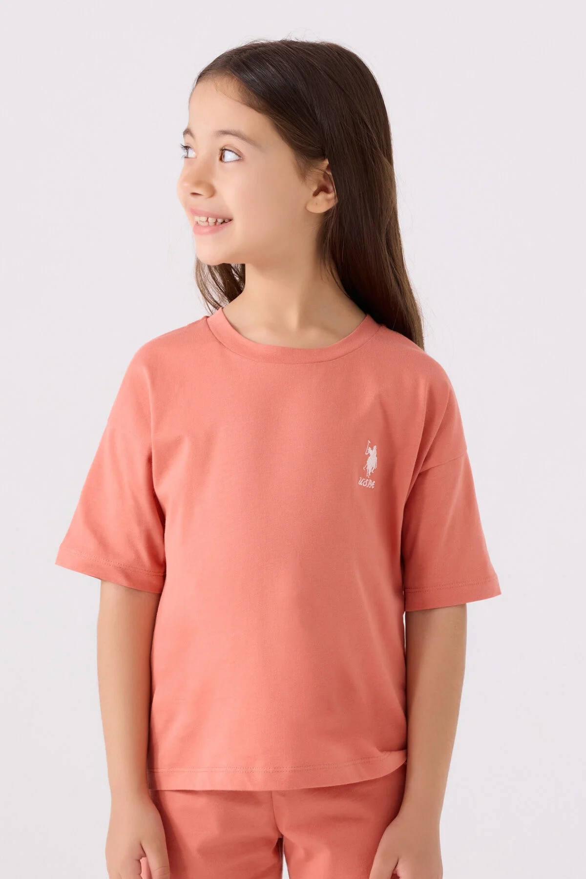 Pembe U.S. Polo Assn kız çocuk Bermuda takım seti, kısa kollu tişört ve şort, marka logosu, çocuk giyim