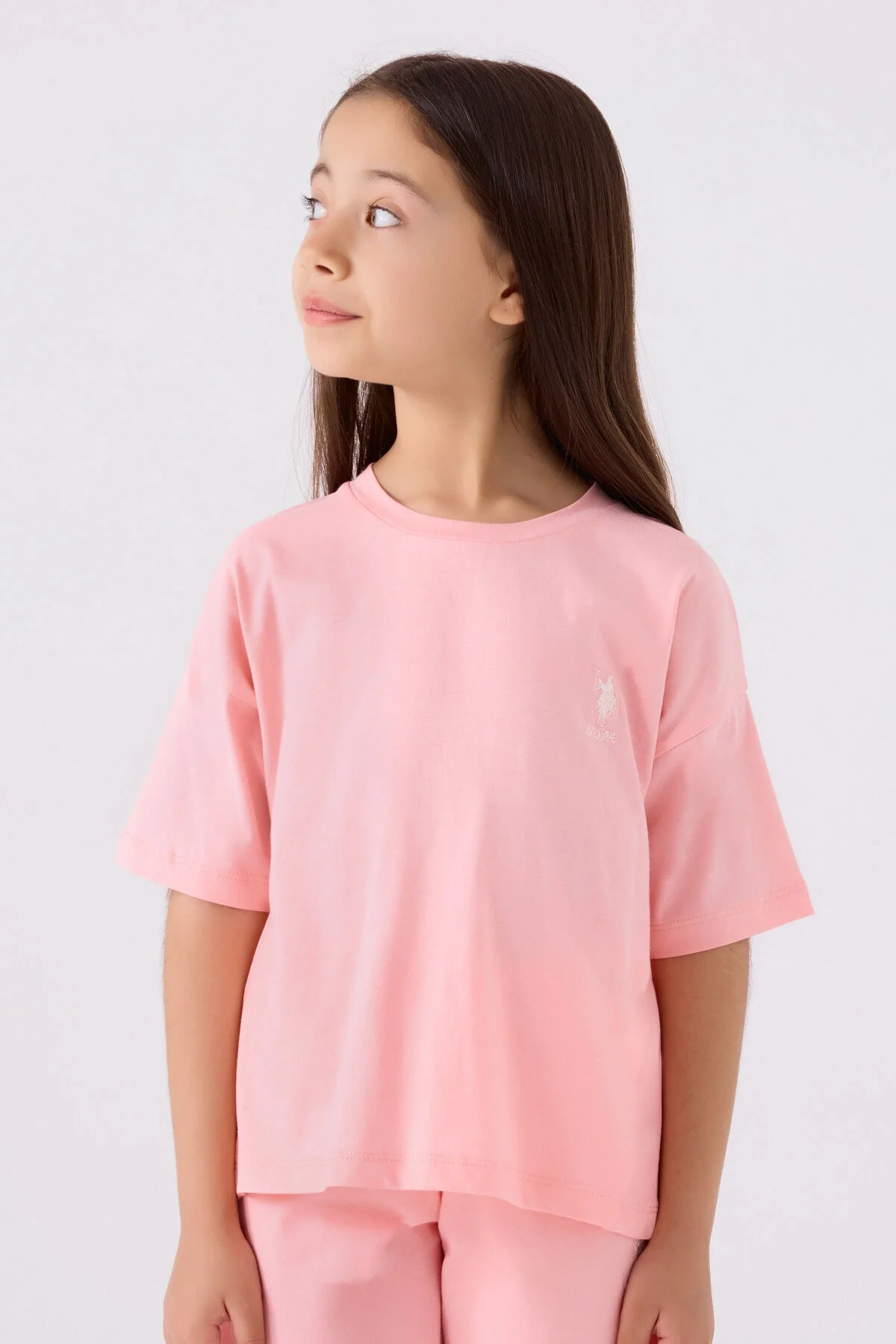 Pembe U.S. Polo Assn Kız Çocuk Bermuda Takımı, çocuk spor giyim, rahat ve modelleriyle yaz mevsimi için ideal