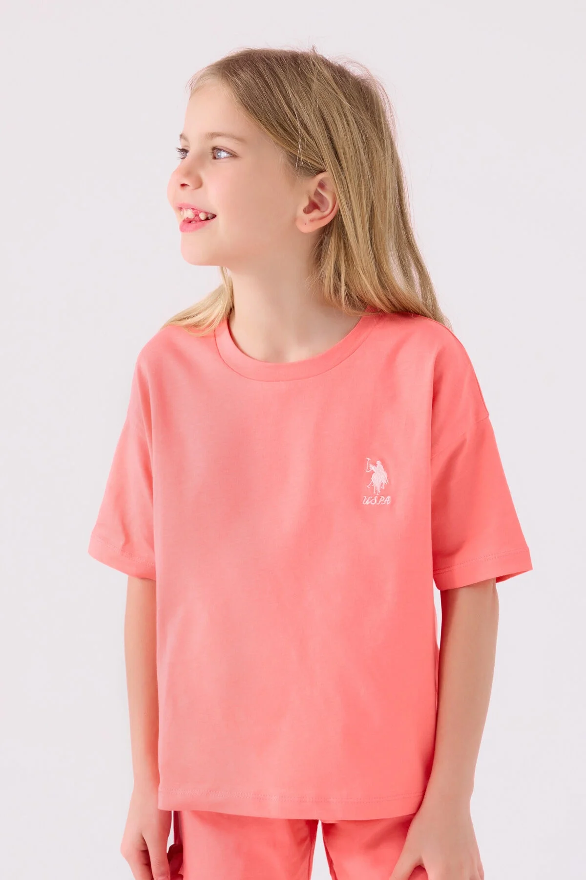 Pembe U.S. Polo Assn kız çocuk Bermuda takım elbette, model ön görünüm, çocuk giyim, yazlık spor takımlar