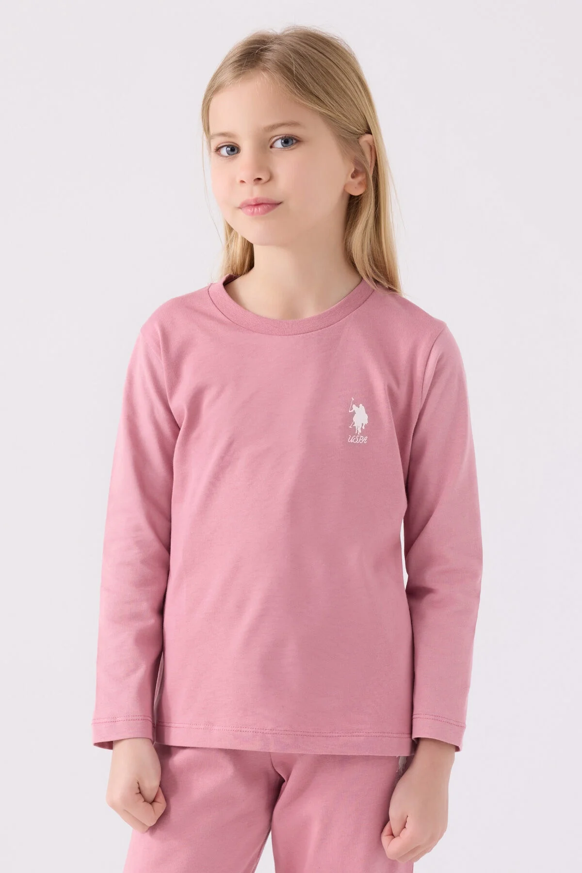 Pembe U.S. Polo Assn kız çocuk pijama takımı, uzun kollu üst ve pantolon, marka logosu, çocuk modeli