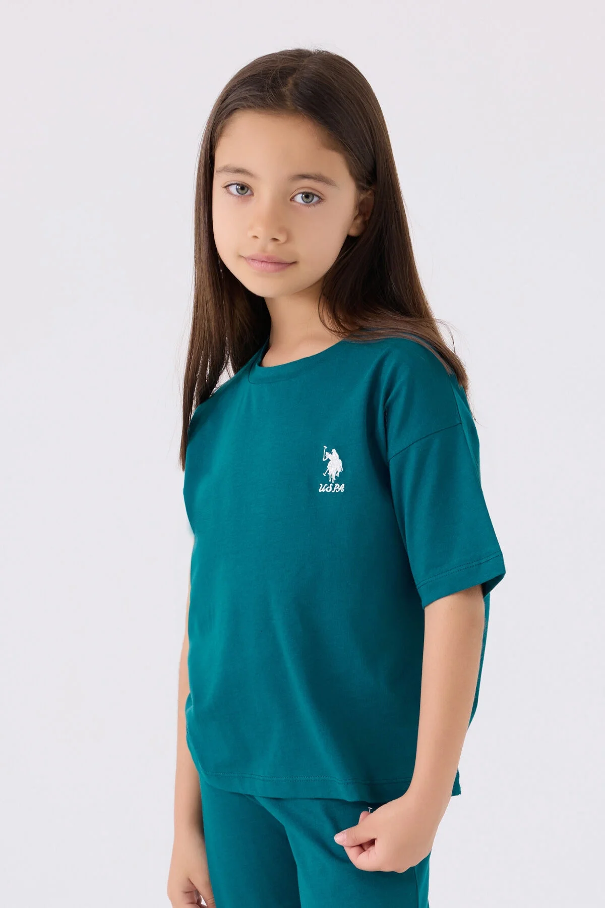 Yeşil U.S. Polo Assn kız çocuk Bermuda takım elbette, marka logosu ile spor ve günlük giyim için ideal