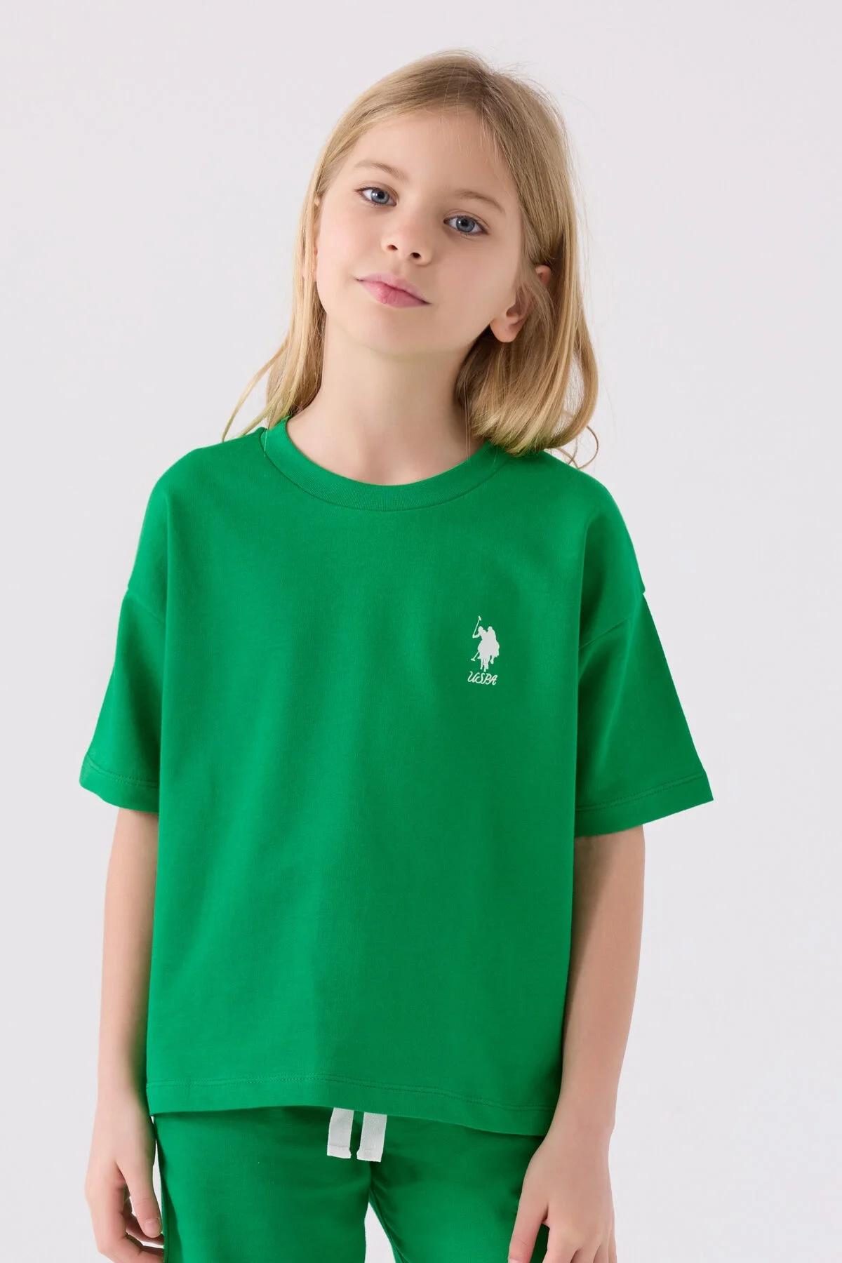 Yeşil U.S. Polo Assn kız çocuk Bermuda takım elbette, marka logosu ve spor tarzı detaylarla